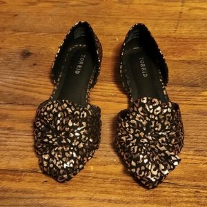 Torrid metallic gold and black animal print flats